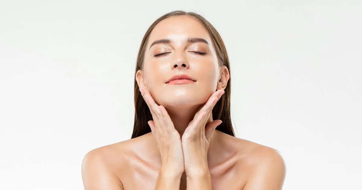 Medical professional applying a microneedling device with radiofrequency (Morpheus8) and PDO Threads to a client's forehead for skin tightening.