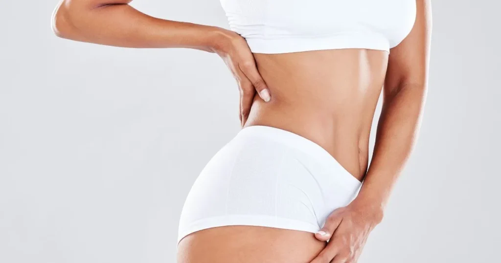 Morpheus8 Body treatment being performed on client’s abdomen at Royalty Wellness Spa