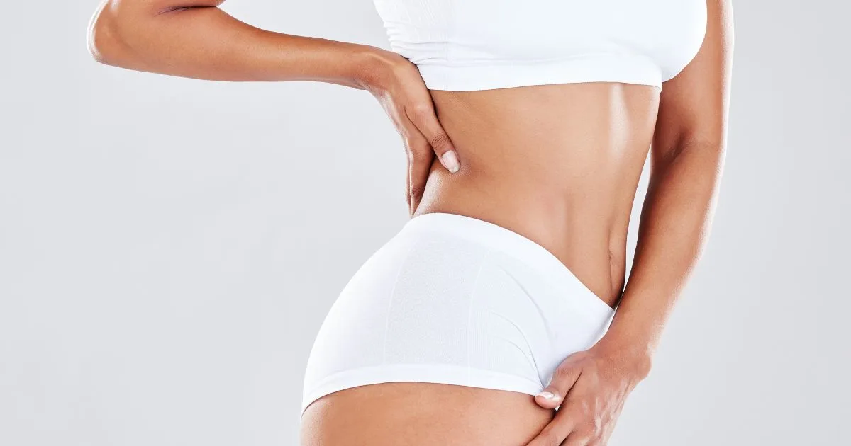 Morpheus8 Body treatment being performed on client’s abdomen at Royalty Wellness Spa